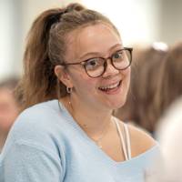 Smiling woman with glasses